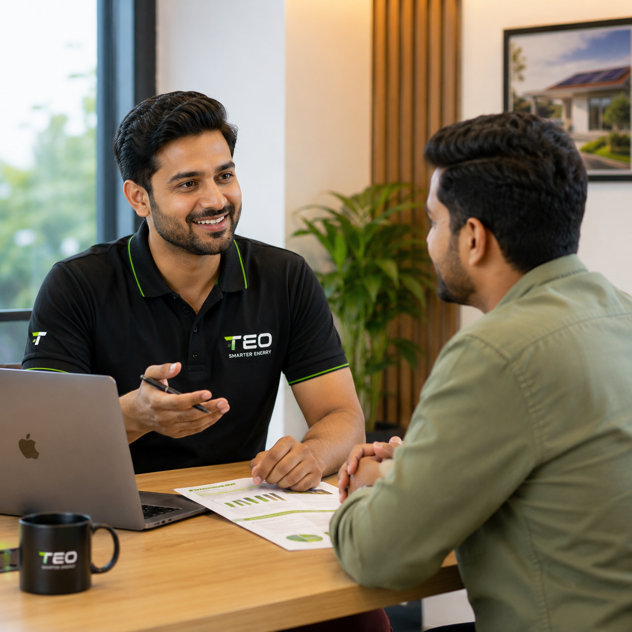 Smiling man with laptop